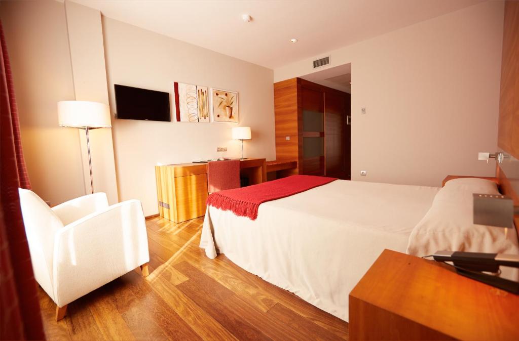 Postel nebo postele na pokoji v ubytování Hotel Ego