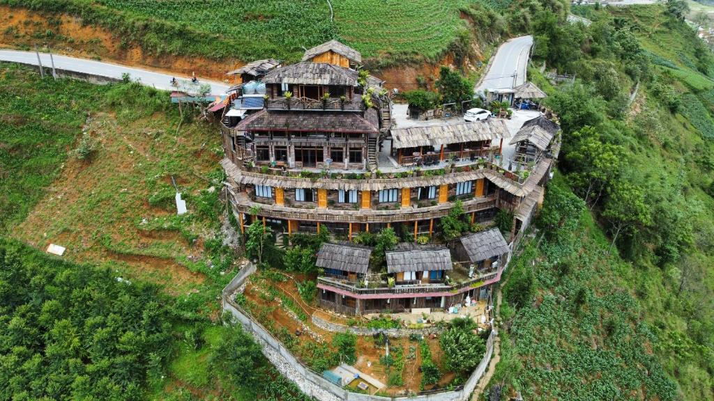 an aerial view of a large house on a hill at Muong Hoa River View Hotel in Sa Pa
