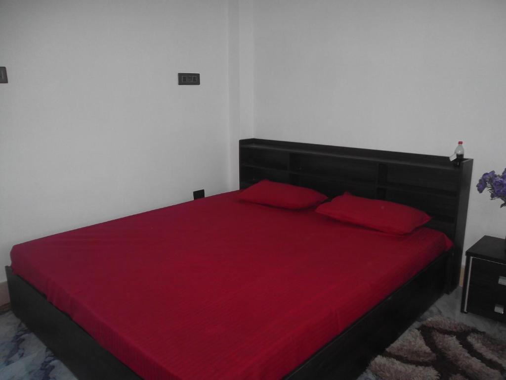 Una cama o camas en una habitación de SAABY HoMESTAY