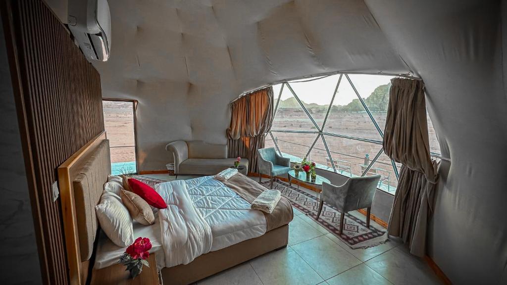 Voodi või voodid majutusasutuse Rum Goldeneye luxury camp toas