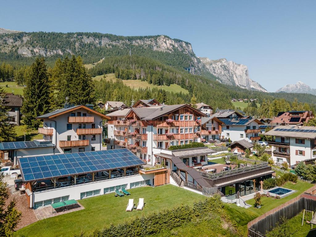 an aerial view of a resort town with a solarium at Pensione Camoscio in La Villa