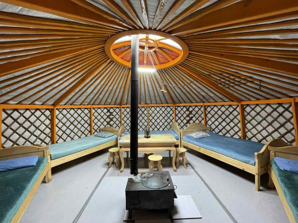 Postel nebo postele na pokoji v ubytování Orkhon Ger Motel