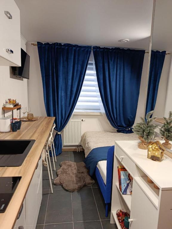 Nhà bếp/bếp nhỏ tại APARTY w Łomiankach