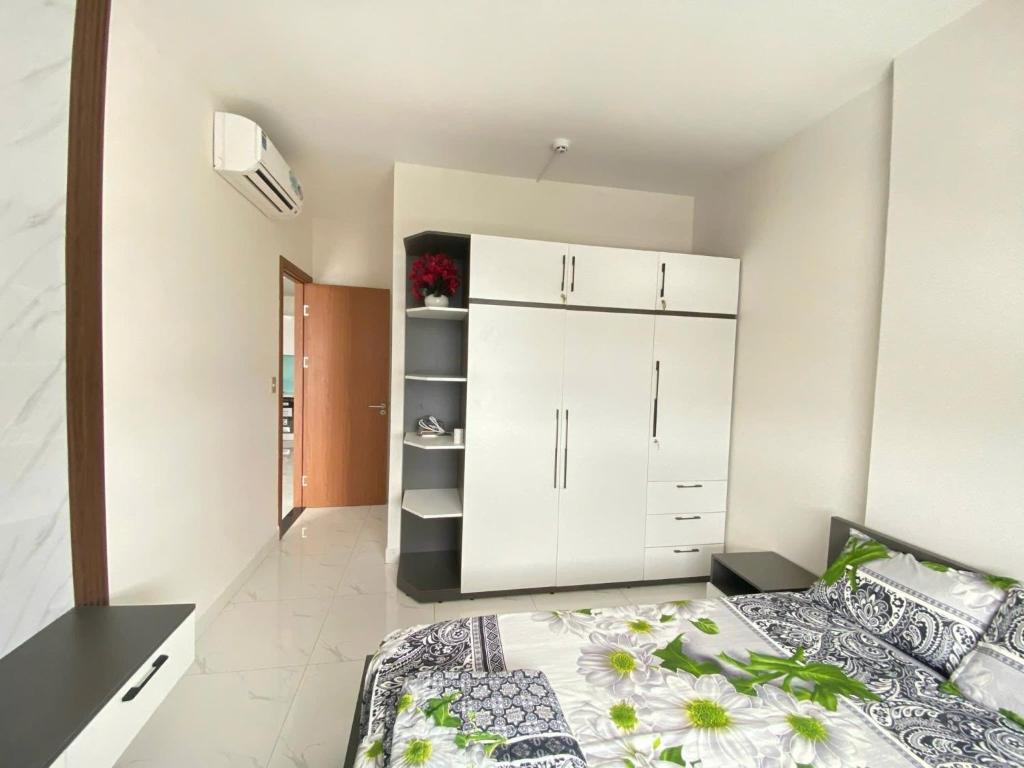 Postel nebo postele na pokoji v ubytování Apartment 3BR Hacom Phan Rang
