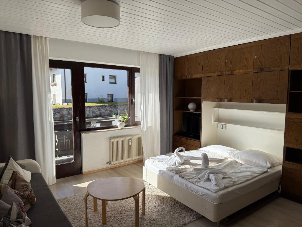 Ένα ή περισσότερα κρεβάτια σε δωμάτιο στο Excelsior Top 17 Alpenherz