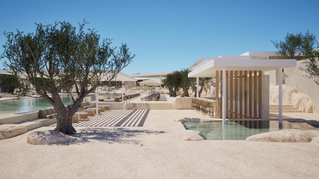 ein Resort mit einem Baum und einem Pool in der Unterkunft Kenshō Paros in Krotiri