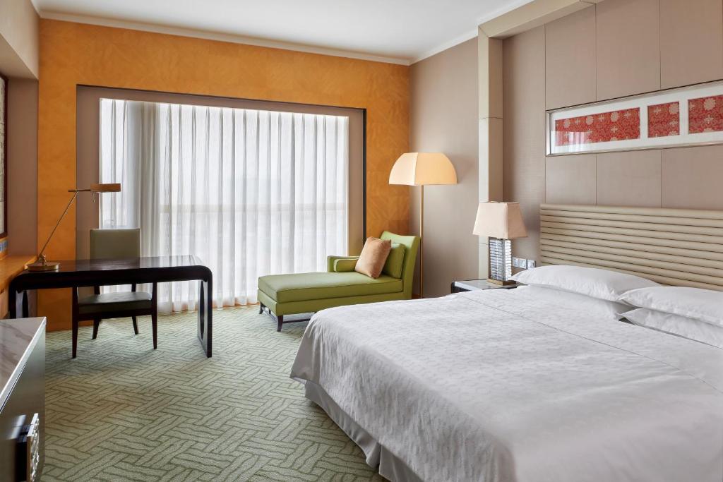 Postel nebo postele na pokoji v ubytování Sheraton Hohhot Hotel