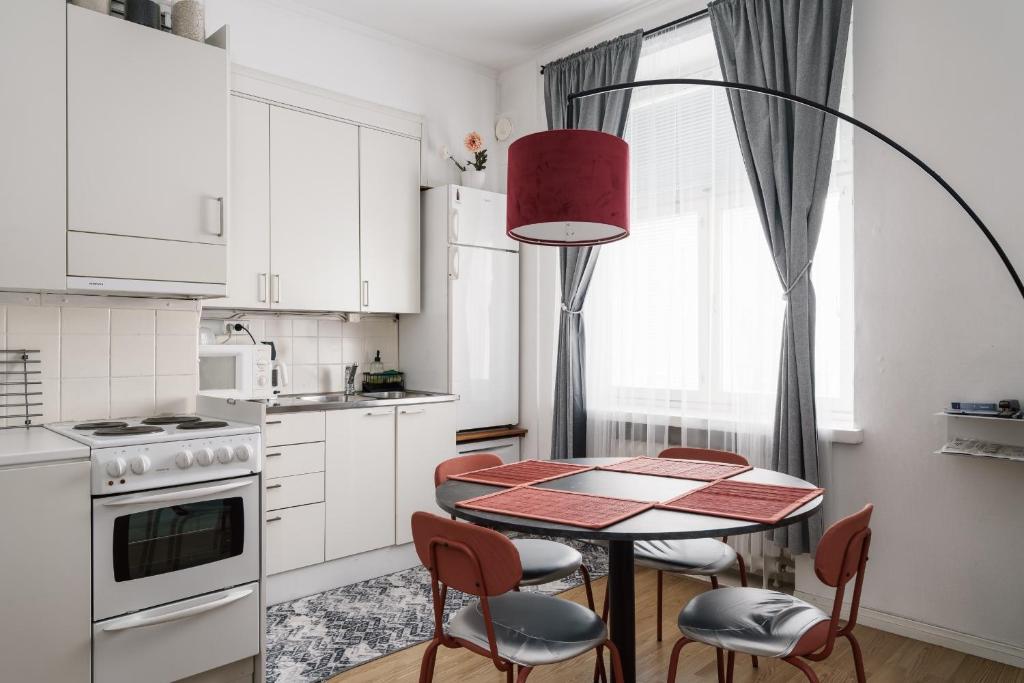 Η κουζίνα ή μικρή κουζίνα στο 1BR Demure Design Urban Living Space