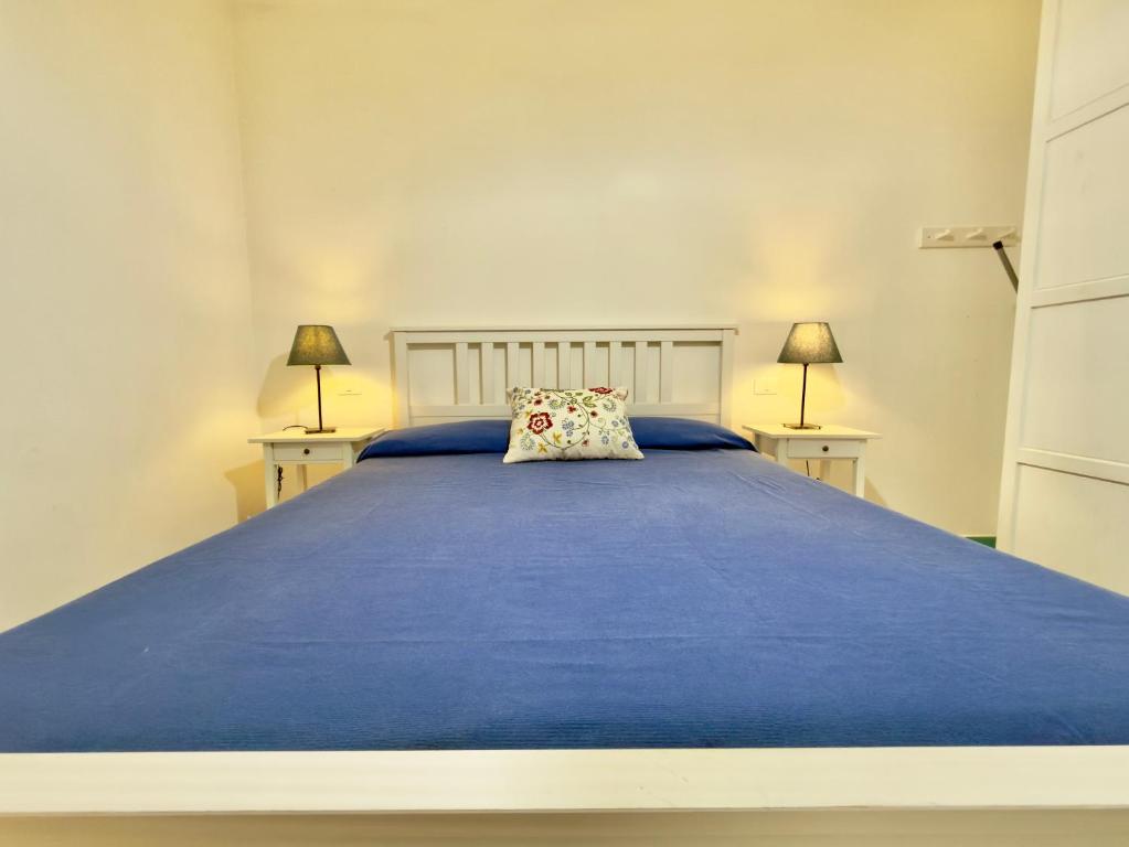 En eller flere senge i et værelse på Casa di Rosa - 500m from the beach