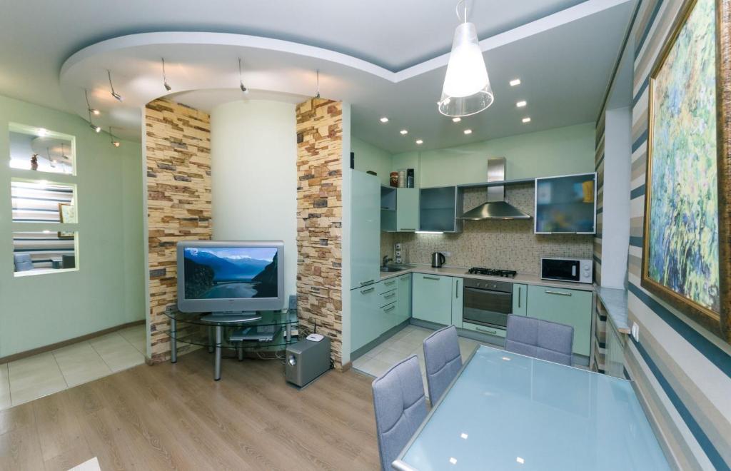 Η κουζίνα ή μικρή κουζίνα στο One bedroom, Luxury, 13 Khreshchatyk str, Maidan