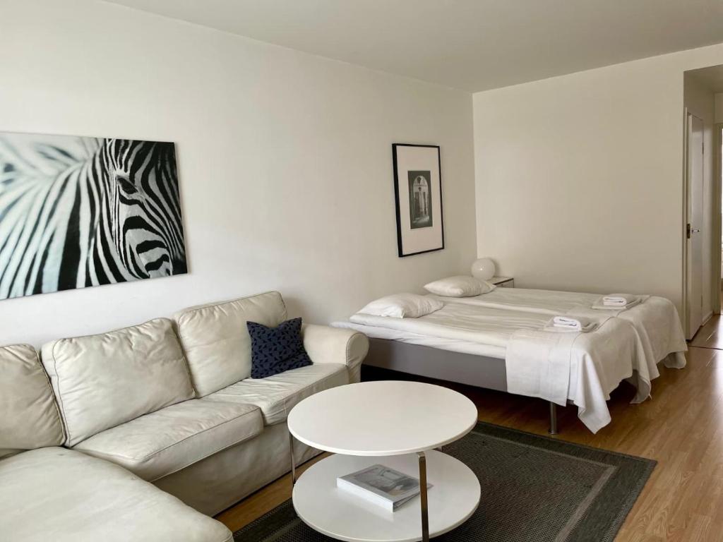 Ένα ή περισσότερα κρεβάτια σε δωμάτιο στο Downtown apartment for 4 - Kotimaailma