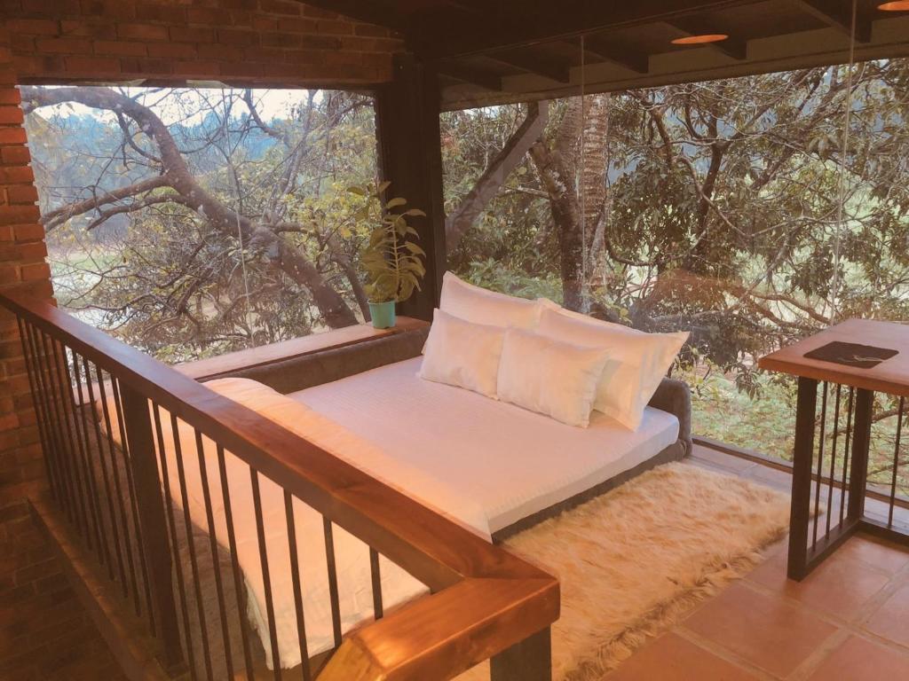 Postel nebo postele na pokoji v ubytování Kay’s Den Kandy