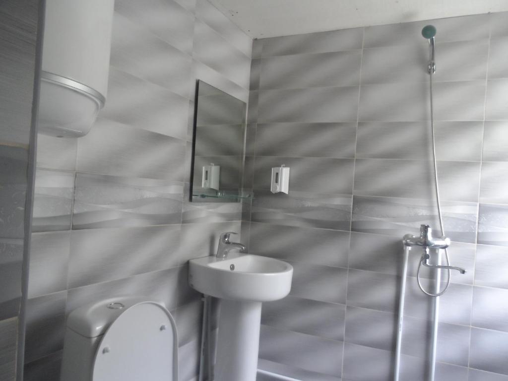 Koupelna v ubytování Hotel Tekla