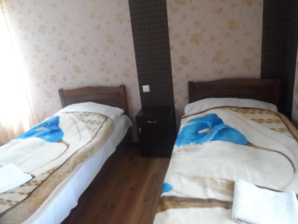 Postel nebo postele na pokoji v ubytování Hotel Tekla