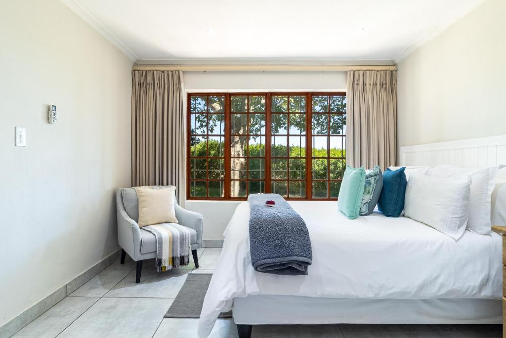 Ένα ή περισσότερα κρεβάτια σε δωμάτιο στο Mon Rêve Estate