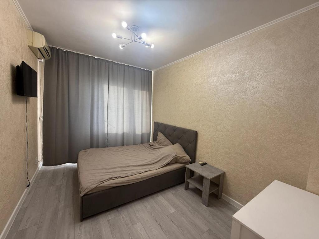 Ένα ή περισσότερα κρεβάτια σε δωμάτιο στο Neue Wohnung