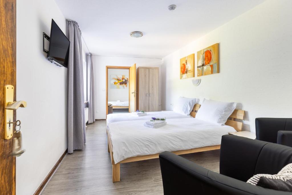 Garni Hotel im Fachwerkhof - Dreibettzimmer