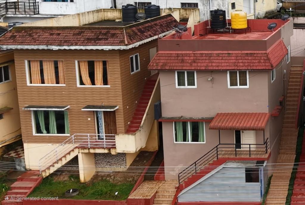 乌提Stay Awhile Cottages的享有红色屋顶房屋的顶部景色