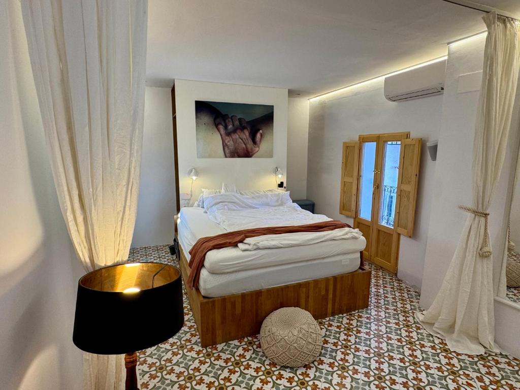 En eller flere senge i et værelse på Casa Kai Altea - Torre de Bellaguarda