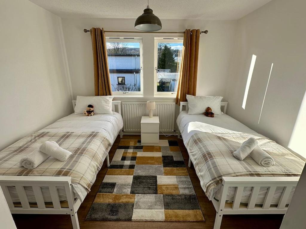 Voodi või voodid majutusasutuse Lochside Hub toas