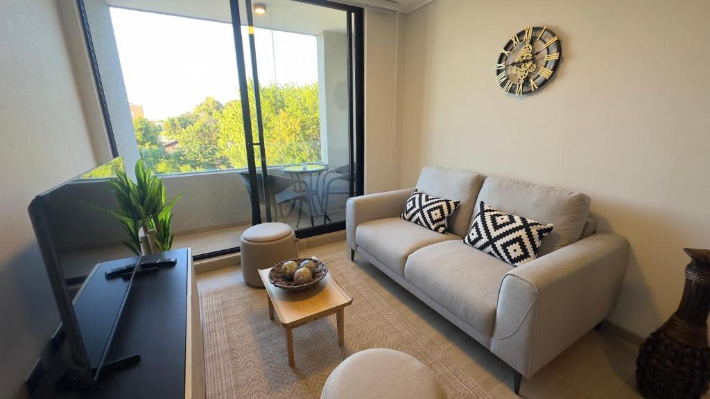 Χώρος καθιστικού στο Oceana Suites en Los Angeles