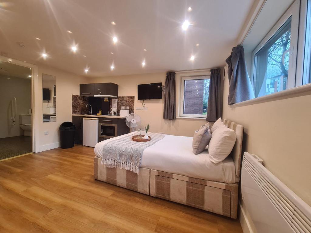 TV a/nebo společenská místnost v ubytování The City Collection