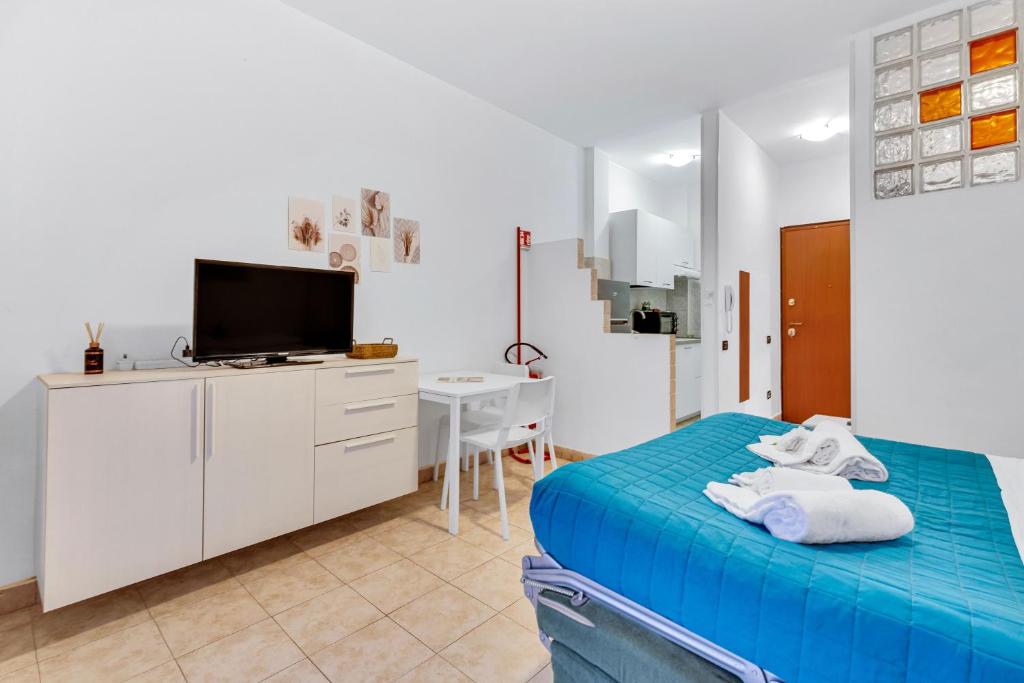 Ένα ή περισσότερα κρεβάτια σε δωμάτιο στο Green Stay Bresso - due passi dal Niguarda