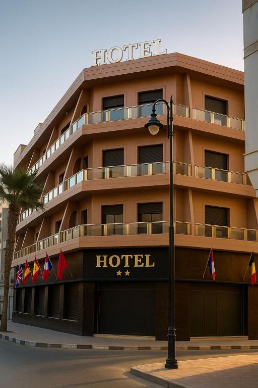 a hotel building with a hotel sign on it at Hotel Estrella del Norte in Larache