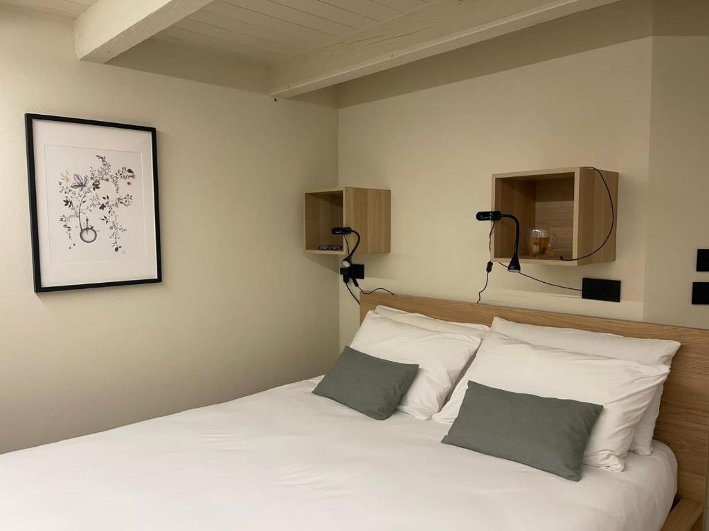 Postel nebo postele na pokoji v ubytování La Maison de Ida - Centro Storico