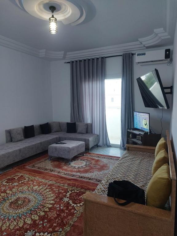 O zonă de relaxare la Location saisonnière entre mer, forêt et calme