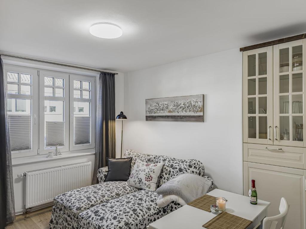 Ένα ή περισσότερα κρεβάτια σε δωμάτιο στο Objekt-Nr 240 - Hafen - Kurgartenstraße