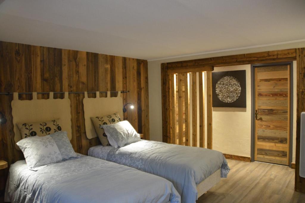 Postel nebo postele na pokoji v ubytování Escargot de Neige