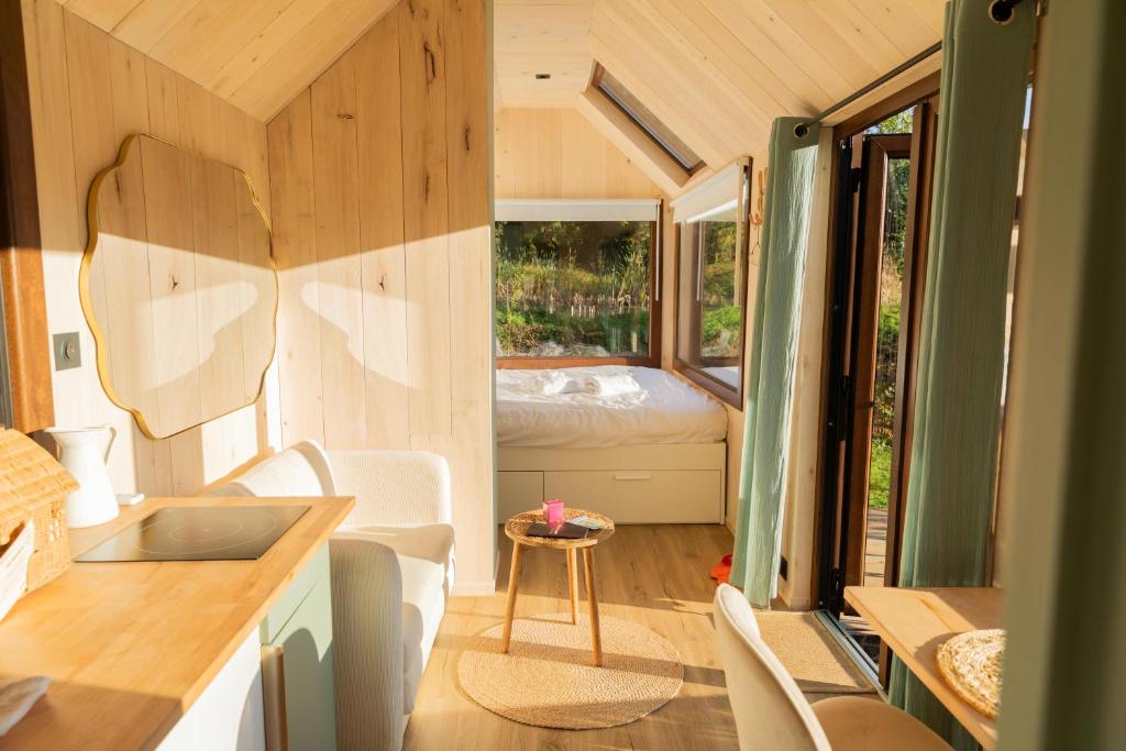 Posezení v ubytování Tiny houses PAMPA Lodges - étang & bain nordique