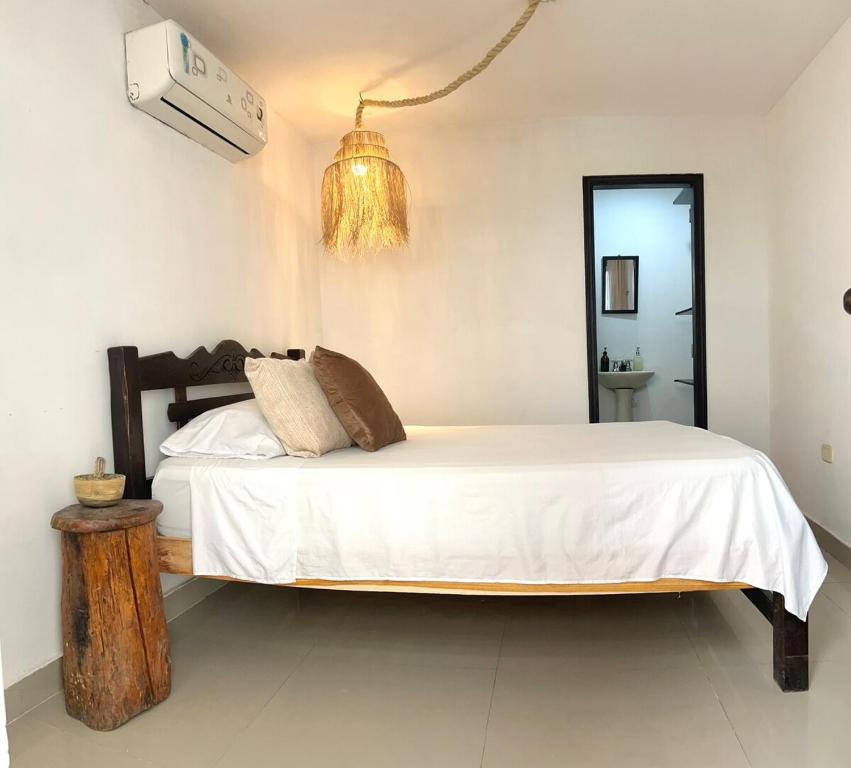 Ένα ή περισσότερα κρεβάτια σε δωμάτιο στο Casa Privada Centro