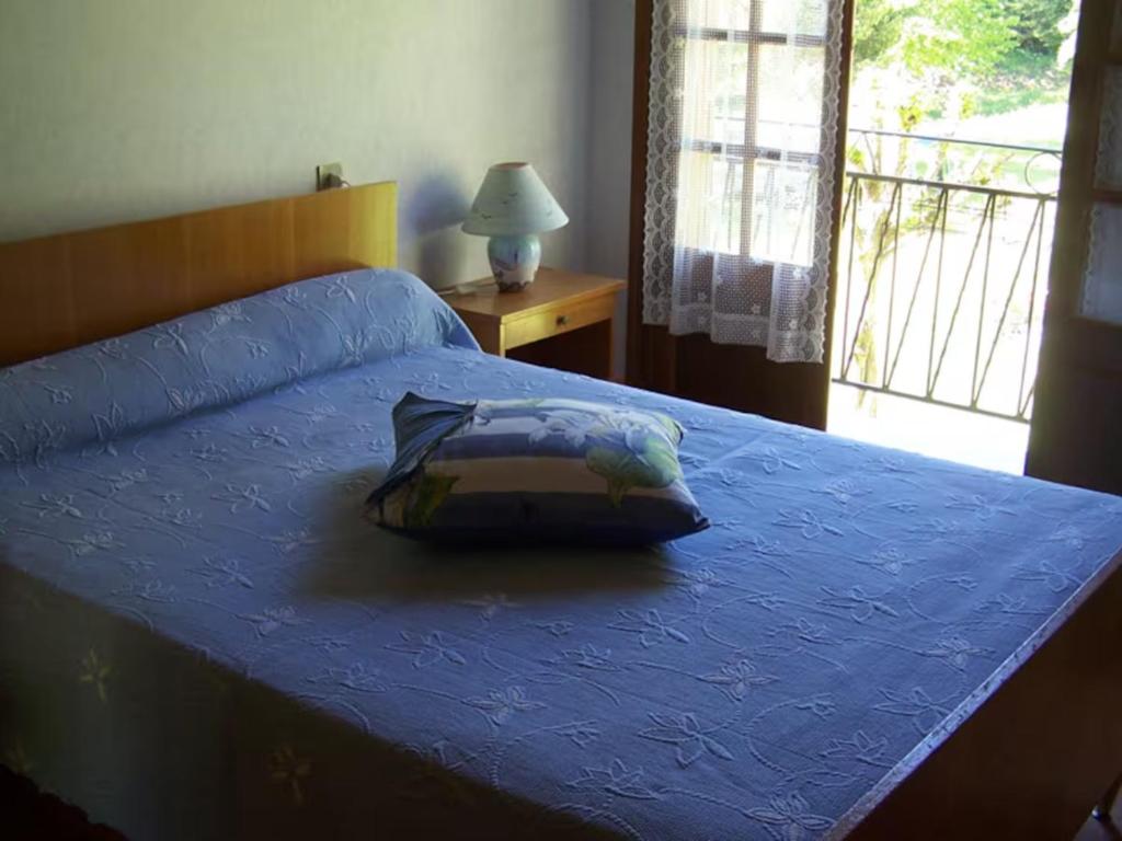 Ένα ή περισσότερα κρεβάτια σε δωμάτιο στο Gite Aspé