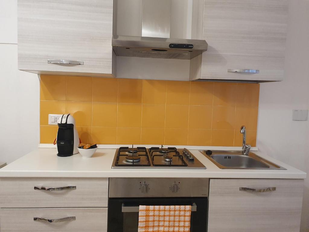 Η κουζίνα ή μικρή κουζίνα στο Fiori e Frutti Guest Home