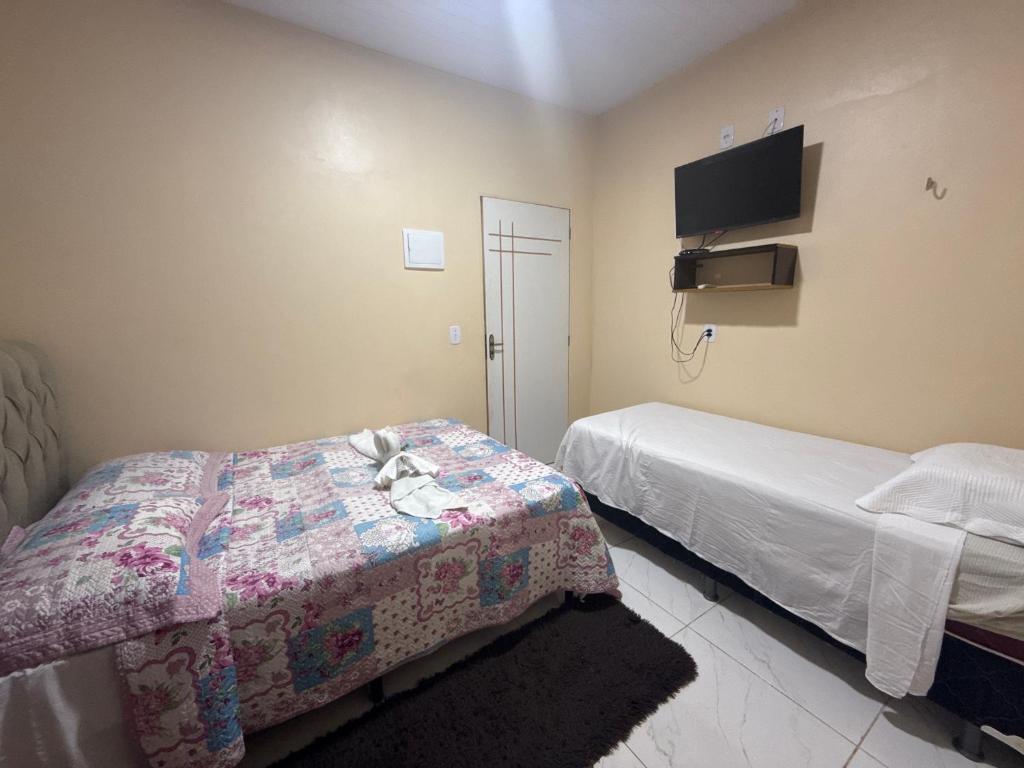 Voodi või voodid majutusasutuse Caribe de Alter - Hotel & Pousada toas