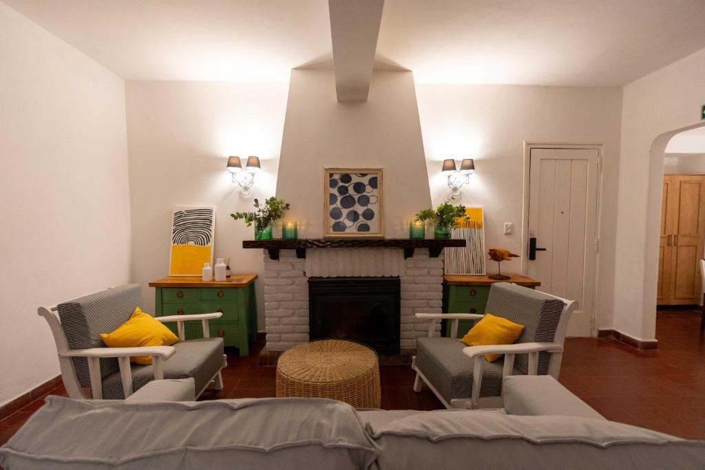 Postel nebo postele na pokoji v ubytování Madaro House