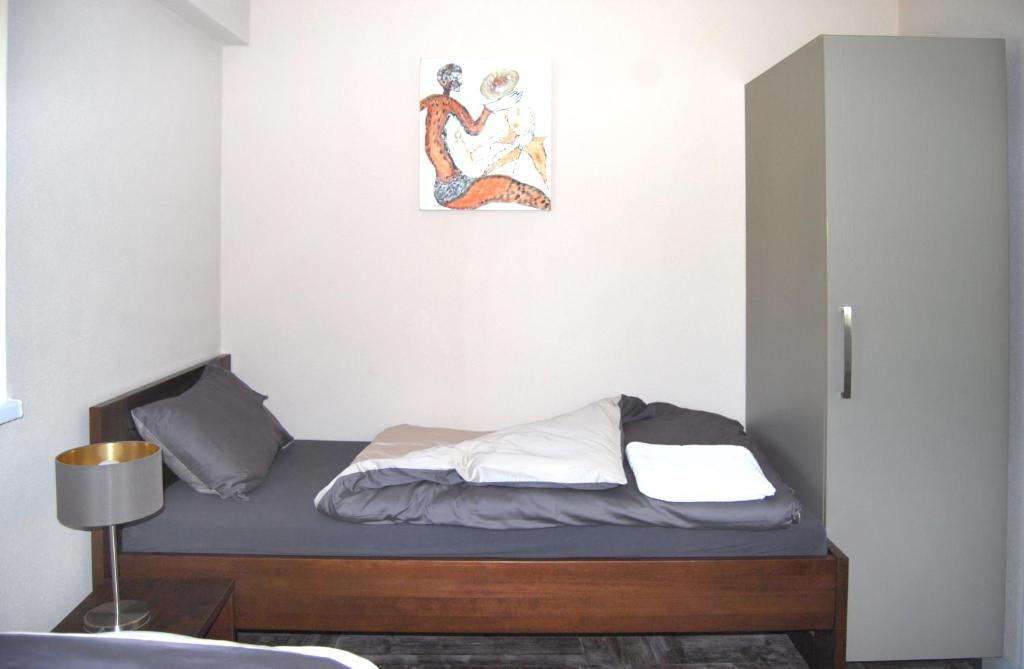 Postel nebo postele na pokoji v ubytování BnB Comfort Guesthouse Olten - Lostorf
