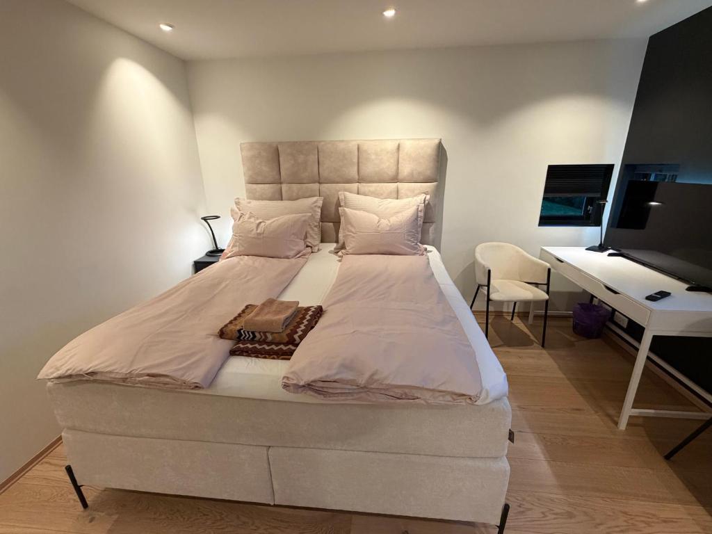 Ένα ή περισσότερα κρεβάτια σε δωμάτιο στο Lillestrøm , the studio flat