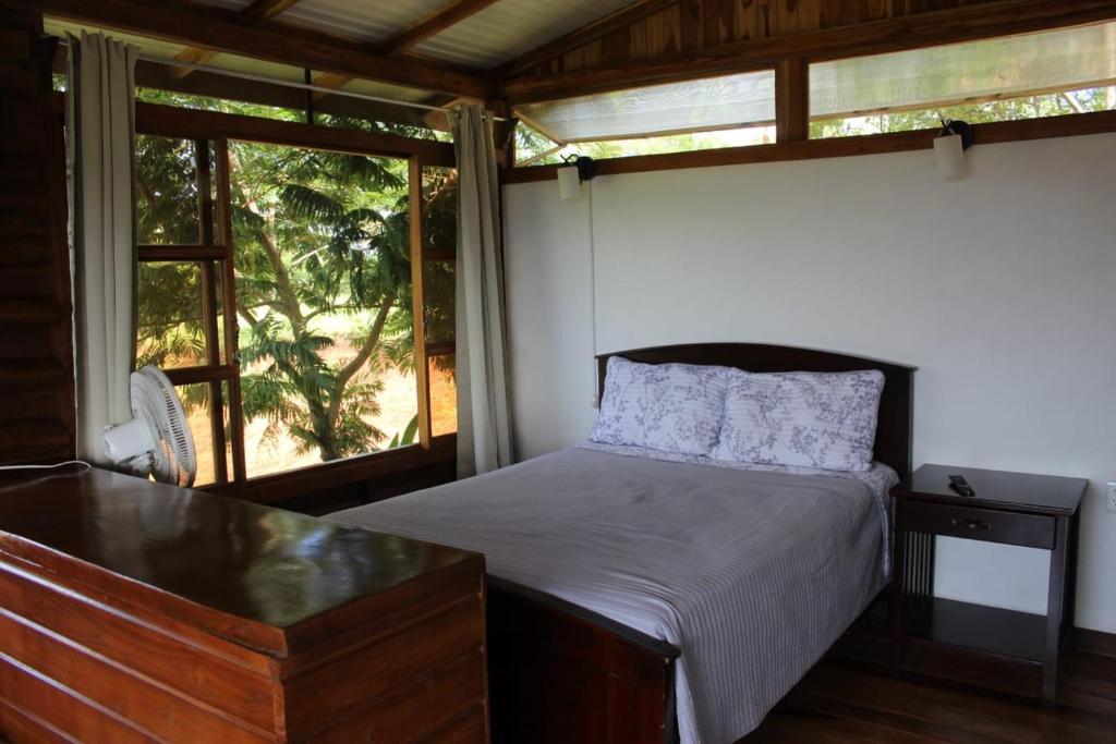 Giường trong phòng chung tại Cabanas Bella Vista