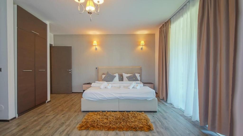 En eller flere senge i et værelse på Breathtaking luxury apartment by MANAGR