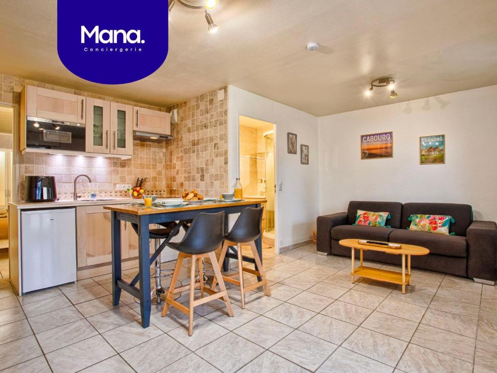 Kuchyň nebo kuchyňský kout v ubytování Cabourg Plage - Wifi & Jardin - Mer à 200m