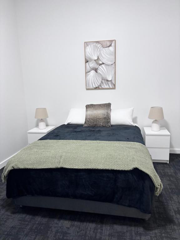 Postel nebo postele na pokoji v ubytování The Club Hotel Collie