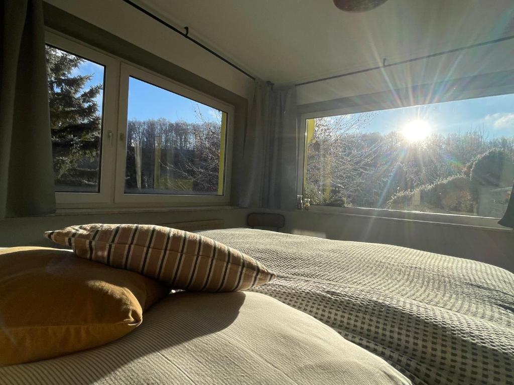 Postel nebo postele na pokoji v ubytování Magnolia Ferienwohnung