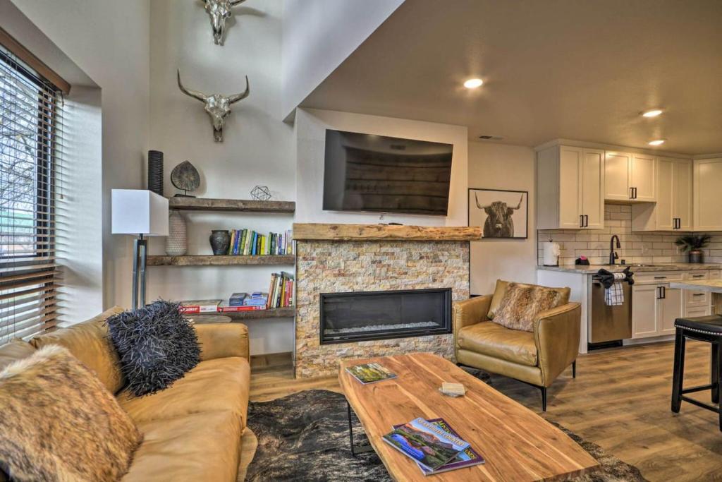 a living room with a couch and a fireplace at Hauser House Unit 1 in Red Lodge