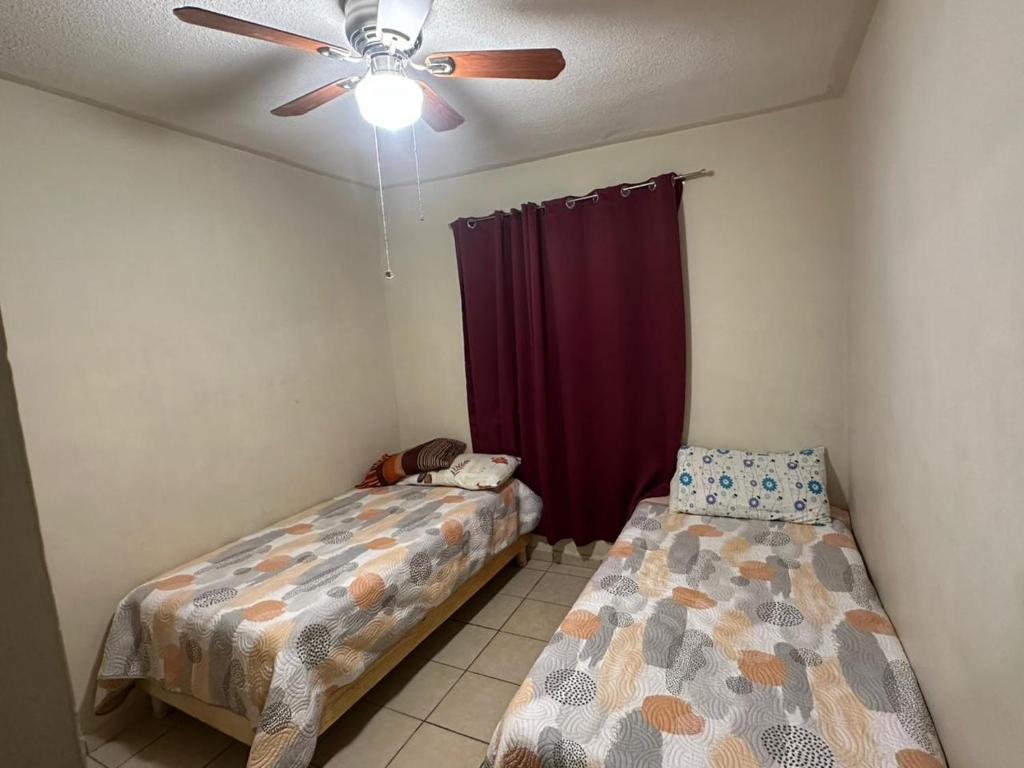 Ένα ή περισσότερα κρεβάτια σε δωμάτιο στο Tu refugio perfecto en Parras