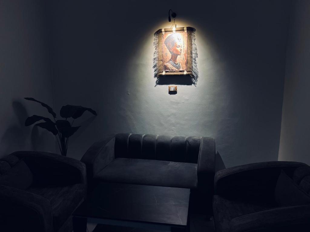 A seating area at Neat & Modern Studio 2Mins Pyramids - Royal desert Inn