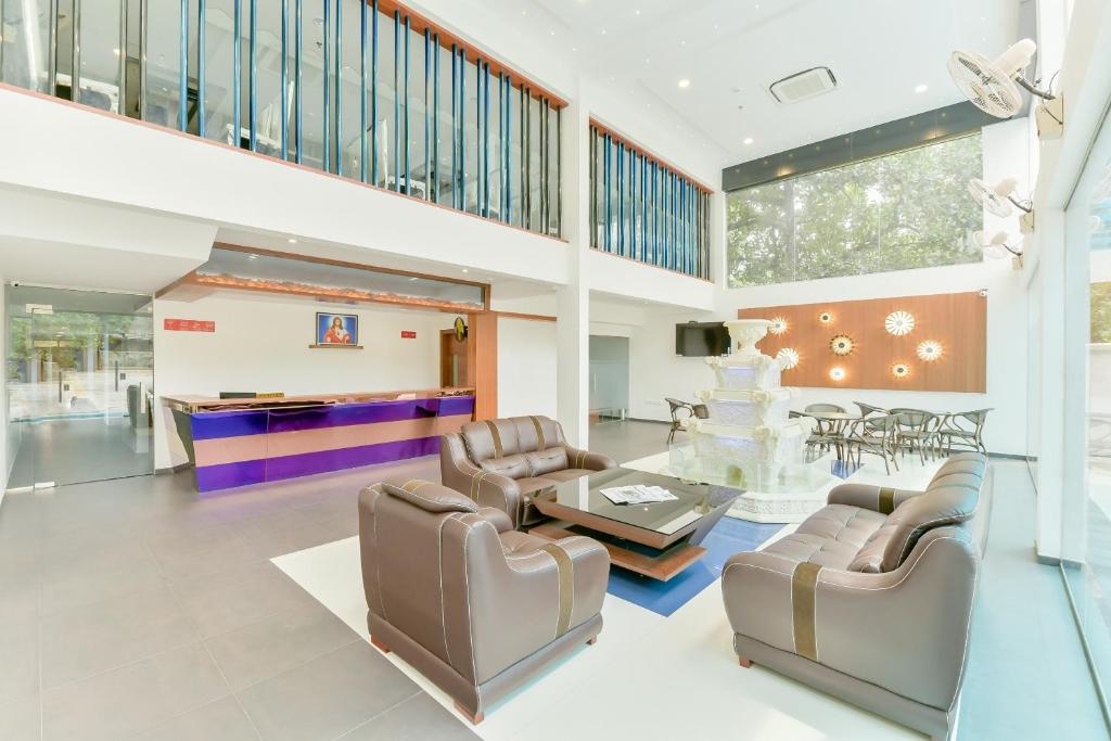 Χώρος καθιστικού στο Super Townhouse Edassery Blue Bells