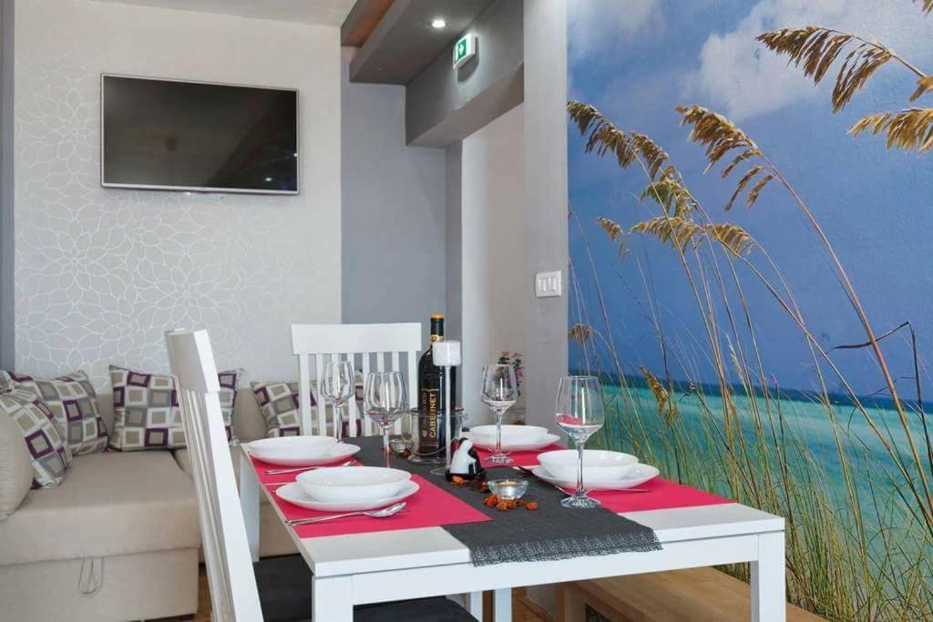 TV a/nebo společenská místnost v ubytování Apartments Romantica